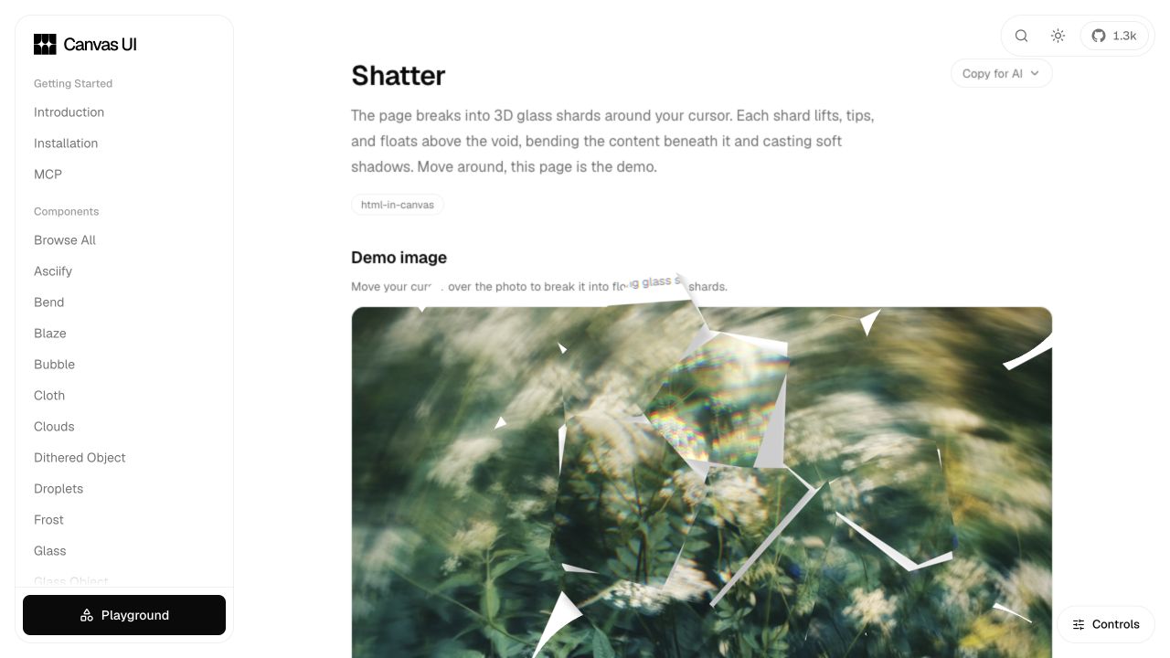 The Canvas UI Shatter demo breaking a photograph into floating glass shards around the pointer