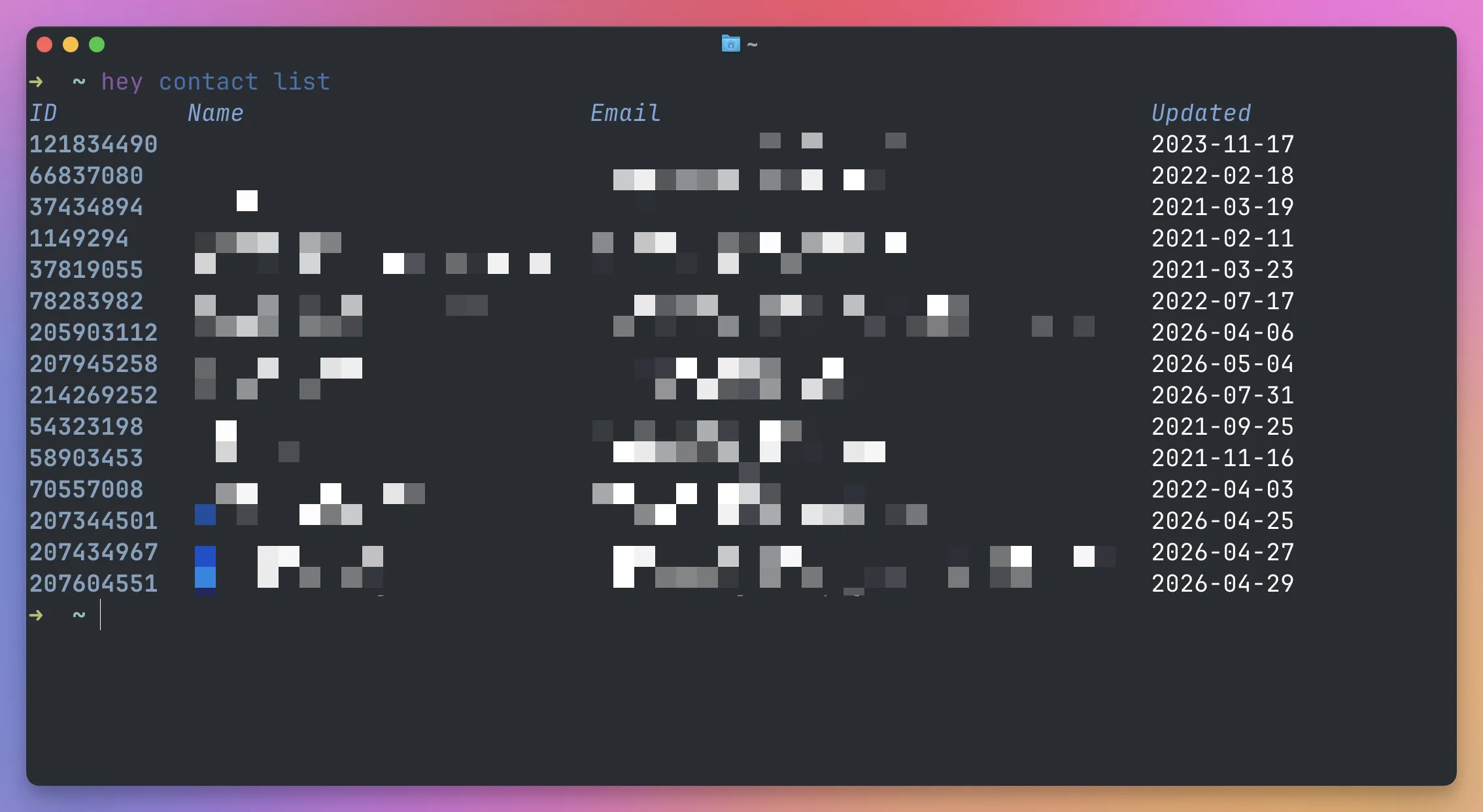 The hey contact list command showing contact IDs, names, email addresses, and update dates